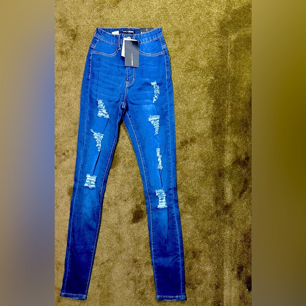 New Distressed Dark Blue Jeans